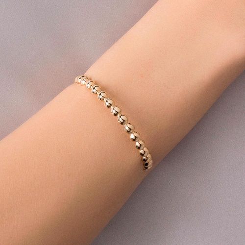 BRACELETE FORMADO POR MEIA ESFERAS BANHADO A OURO 18K