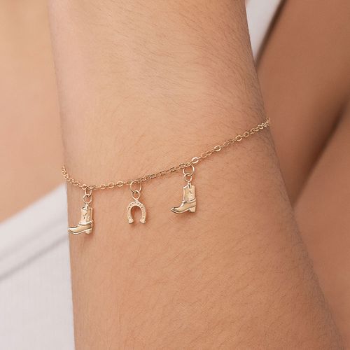 PULSEIRA COM BOTAS E FERRADURA BANHADA A OURO 18K