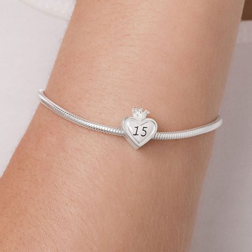 BERLOQUE CORAÇÃO 15 ANOS DE PRATA MACIÇA 925 COM ZIRCÔNIAS E RESINA