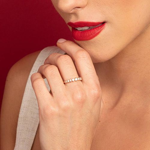 MEIA ALIANÇA BANHADA  A OURO 18K COM ZIRCÔNIAS