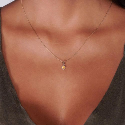 PINGENTE INFANTIL BANHADO A OURO 18K NO FORMATO SOL COM RESINA