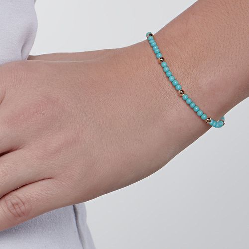 PULSEIRA FORMADA POR MISSANGAS E ESFERAS BANHADA A OURO 18K