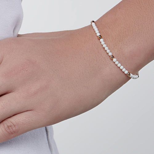 PULSEIRA FORMADA POR MISSANGAS E ESFERAS BANHADA A OURO 18K