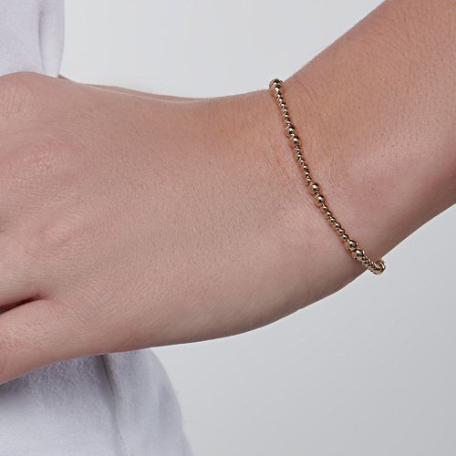 PULSEIRA COMPOSTA POR ESFERAS BANHADA A OURO 18K
