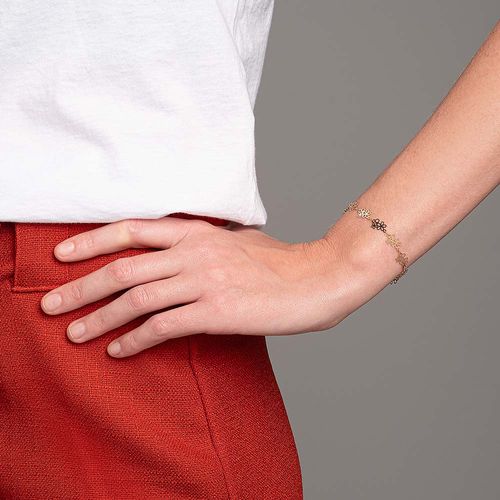 PULSEIRA FLORES BANHADA A OURO 18K