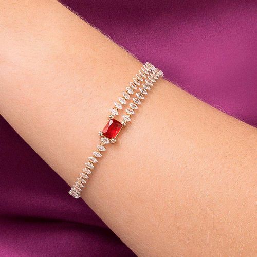 PULSEIRA BANHADA A OURO 18K COM ZIRCÔNIAS E CRISTAL BAGUETE