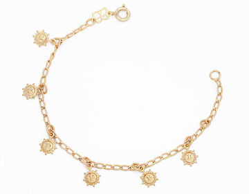 PULSEIRA BANHADA A OURO 18K COM BERLOQUES DE SOL