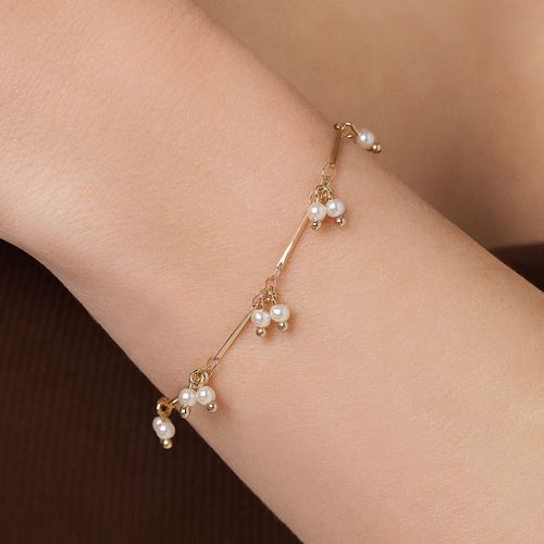 PULSEIRA BANHADA A OURO 18K COM PÉROLAS SINTÉTICAS
